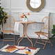 rod iron table and chairs